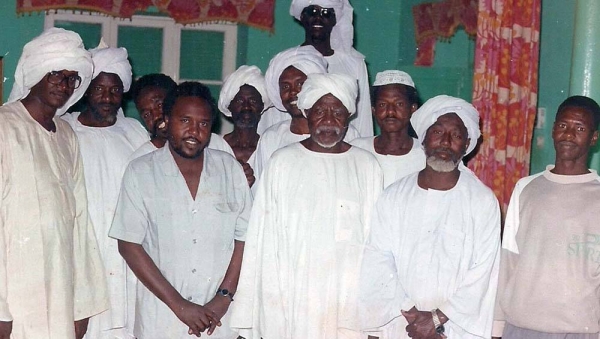 UN News' Abdelmonem Makki and his nephews in the village where he was raised in South Darfur, Sudan. — courtesy UN News/Abdelmonem Makki