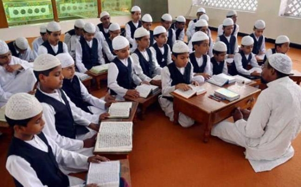 Madrasas provide a system of education in which students are taught about the Qur'an and Islamic history alongside general subjects like math and science. — Courtesy photo
