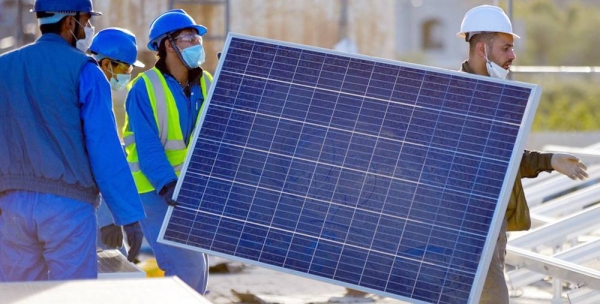 Men install solar panels for a hospital in Yemen. — courtesy UNDP Yemen