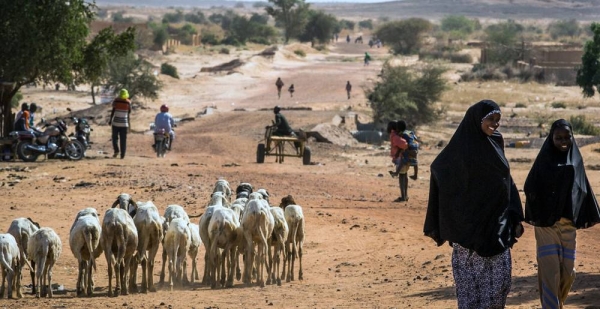 File photo shows people walking on a road in the Tillaberi region in western Niger. — courtesy UNICEF/Vincent Tremeau
