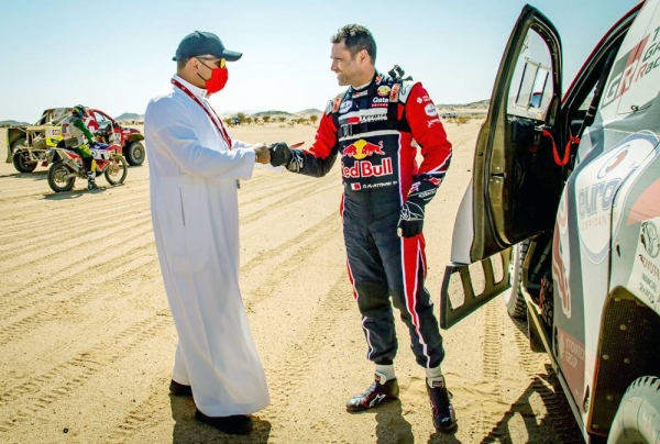 Nasser Al Attiyah with Chairman of Saudi Auto Federation Prince Khalid Sultan Bin Abdullah Al Faisal during the Dakar Rally.