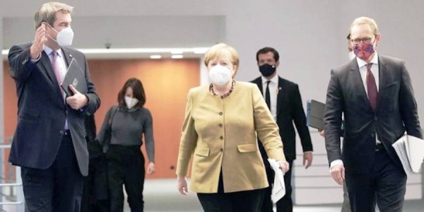 German Chancellor Angela Merkel has extended and tightened the country's coronavirus lockdown as its death toll surpassed 35,000.