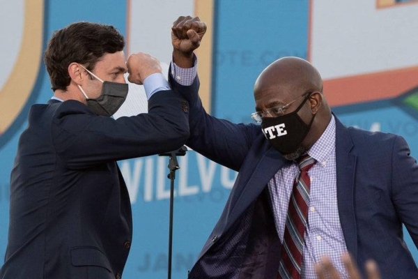 Jon Ossoff and Raphael Warnock defeated Republicans David Perdue and Kelly Loeffler two months after Biden became the first Democratic presidential candidate to carry the state since 1992. — Courtesy photo
