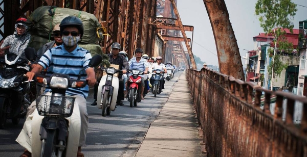 
File photo shows motorcyclists crossing a bridge in Vietnam. According to the UN human rights office, many activists and journalists have been detained under ‘vaguely defined laws’, with several receiving lengthy sentences. — courtesy UN Photo/Kibae Park