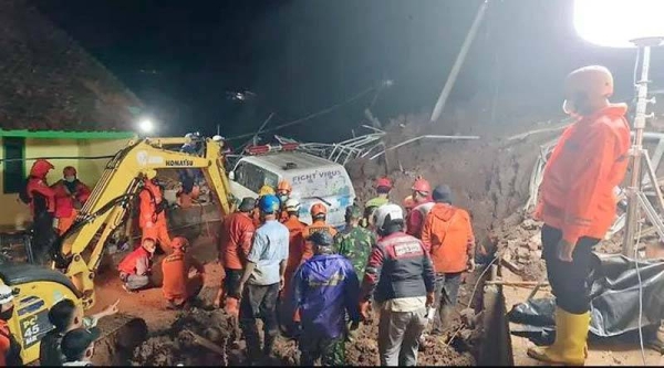 A landslide in Cihanjuang village in Indonesia's West Java province on Saturday has killed at least 11 people. — courtesy Twitter/@BNPB_Indonesia)