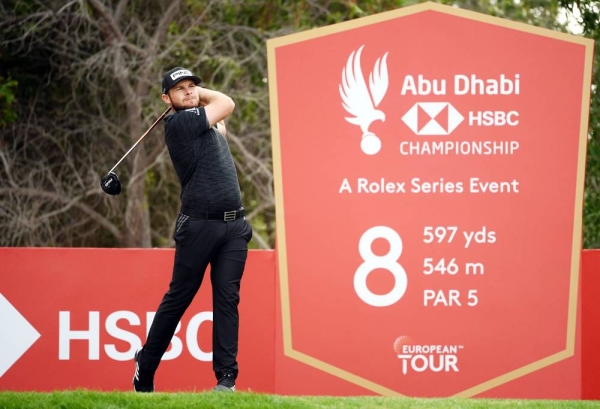 Tyrrell Hatton of England tees off on the 8th hole during Day 2 of the Abu Dhabi HSBC Championship at Abu Dhabi Golf Club on Friday in Abu Dhabi, United Arab Emirates. (Photo by Ross Kinnaird)