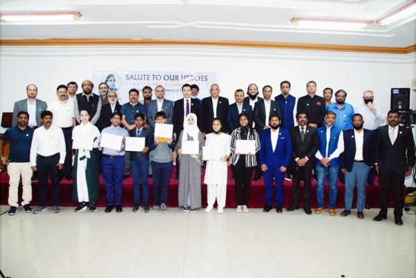 Acting Indian Consul General Y. Sabir poses for a photo with winners of Brig, Usman Memorial Storytelling Contest and organizers of the event at Indian Consulate in Jeddah.