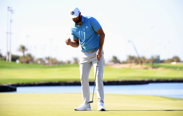 Dustin Johnson of the USA with the winners trophy after the final round of the Saudi International powered by SoftBank Investment Advisers at Royal Greens Golf and Country Club on Sunday in King Abdullah Economic City, Saudi Arabia. (Photo by Ross Kinnaird)