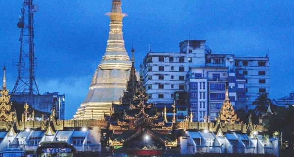 

A pagoda at dawn in downtown Yangon, the commercial hub of Myanmar. — courtesy Unsplash/Kyle Petzer