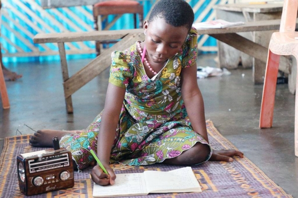 A young boy in Ethiopia attends class at home, taking lessons via the radio, which are being broadcast across the country. — courtesy UNICEF/Nahom Tesfaye