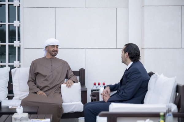 Crown Prince of Abu Dhabi Sheikh Mohamed bin Zayed Al Nahyan, who is also the deputy supreme commander of the UAE armed forces, left, receives Saad Hariri, prime minister-designate of Lebanon at Al Shati Palace in Abu Dhabi on Friday. — WAM photo

( Rashed Al Mansoori / Ministry of Presidential Affairs )
---