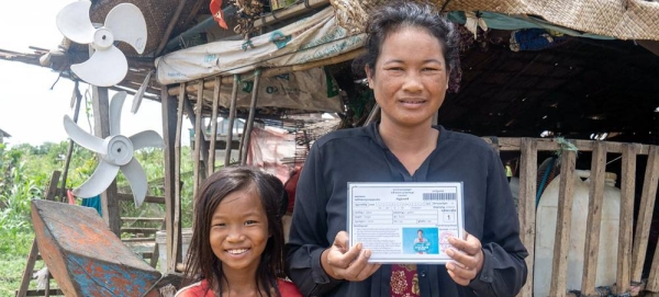 
A Cambodian woman shows her government-issued IDPoor card. — courtesy UNDP Cambodia/Kimheang Toun