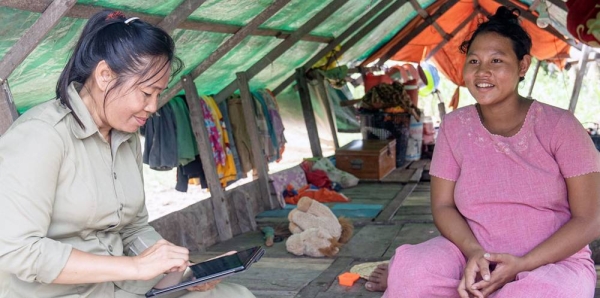 
A Cambodian woman shows her government-issued IDPoor card. — courtesy UNDP Cambodia/Kimheang Toun