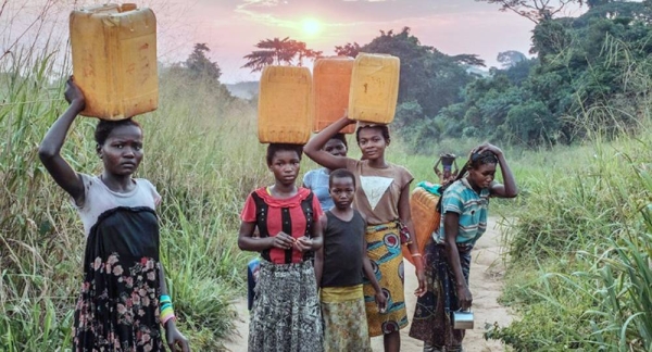 Young girls carry water from a source near Yangambi, Democratic Republic of the Congo. — courtesy CIFOR/Axel Fassio