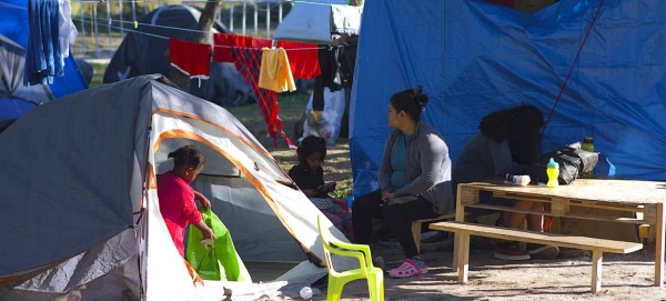 Asylum seekers, including children, at the Matamoros camp awaiting their US immigration hearings in Mexico. — Courtesy photo