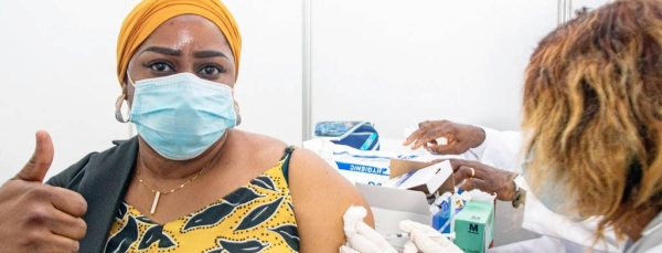 A health worker in Abidjan, Côte d'Ivoire, becomes one of the first people to receive the COVID-19 vaccine as part of the global rollout of COVAX in Africa. — courtesy UNICEF/Milequem Diarassouba