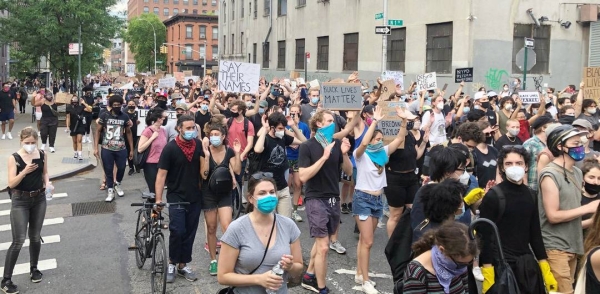 
In Brooklyn, New York, protesters peacefully demonstrate against police violence, following the death of George Floyd, in May 2020. — courtesy UN News/Daniel Dickinson
