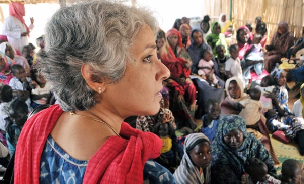 WHO Deputy Director-General for Programs (DDP) Soumya Swaminathan speaking with members of the South Sudanese refugee community at the Almanar Health Center in Mayo, Khartoum. (February 2018). — courtesy WHO Sudan/Simon van Woerden