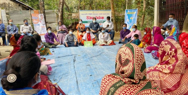 Female tea workers are going to drop the collected leaves at factory. Tea leaf pickers get 120 Taka ($1.5) daily wages to collect 24 kg leaves. — courtesy ILO/Alexius Chicham