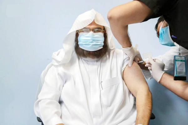 Sheikh Abdul Rahman Al-Sudais, head of the Presidency for the Affairs of Two Holy Mosques receiving the first dose of COVID-19 vaccine on Sunday at King Abdullah Medical City (KAMC) in Makkah.