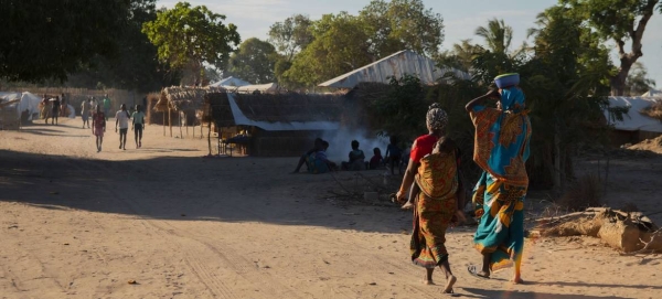Two women walk at an IDP camp in Cabo Delgado, Mozambique, in this courtesy file photo. 