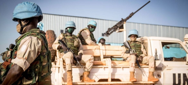 Peacekeepers serving with the UN's Multidimensional Integrated Stabilization Mission in Mali (MINUSMA) wear face masks while on patrol in this courtesy file photo.
