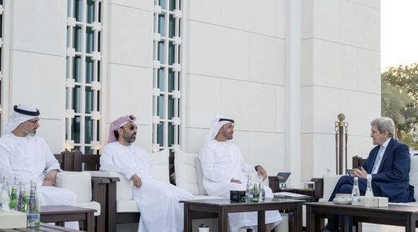 Sheikh Mohamed Bin Zayed Al Nahyan, crown prince of Abu Dhabi and deputy supreme commander of the UAE Armed Forces (3rd L), meets with John Kerry, US Presidential Envoy for Climate (R), at Al Shati Palace. Also seen Maj. Gen. Sheikh Khaled Bin Mohamed Bin Zayed Al Nahyan, deputy National Security adviser, member of the Abu Dhabi Executive Council and Chairman of Abu Dhabi Executive Office (L) and Sheikh Tahnoon Bin Zayed Al Nahyan, UAE National Security Advisor (2nd L). — courtesy WAM