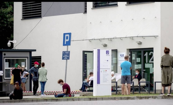 People wait to be tested for coronavirus at a hospital in the southern Polish city of Kraków. — courtesy PAP