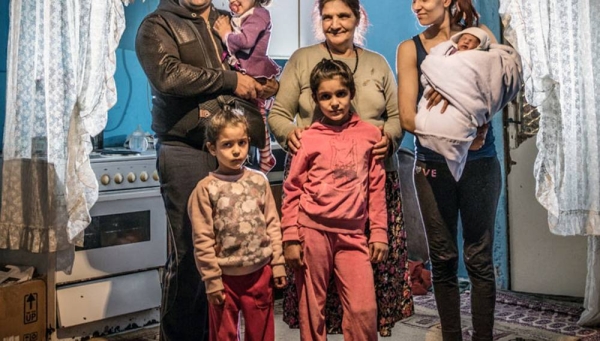 File photo shows a family at home in a Roma settlement in Belgrade, Serbia. — courtesy UNICEF/Ashley Gilbertson VII