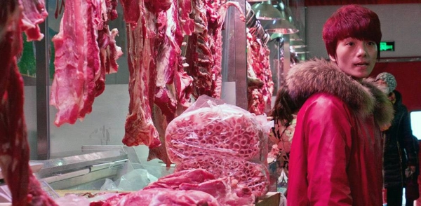 A meat stall in a market in Beijing, China. — courtesy FAO/Justin Jin