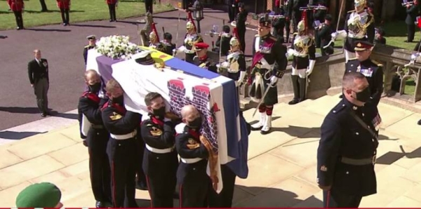 A video grab of the solemn ceremony of Prince Phillip's funeral with his casket arriving at the St George's Chapel on Saturday.