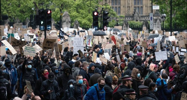 People protest in London in support of Black Lives Matter. June 2020. — courtesy Unsplash/James Eades