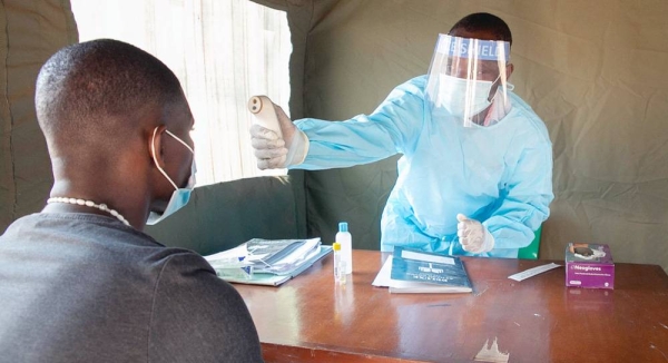 Eunice Marorongwe recovered from COVID-19 and is back at work helping patients. — courtesy UNICEF