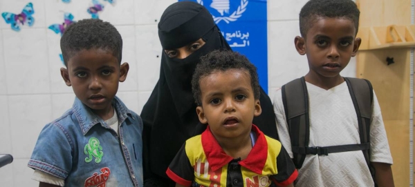 A mother brings her children for nutrition checks at a WFP-supported clinic in Aden, Yemen, in this courtesy file photo
