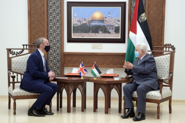 Palestinian President Mahmoud Abbas, right, met with British Foreign Secretary Dominic Raab in Ramallah, West Bank, on Wednesday. — Courtesy WAFA