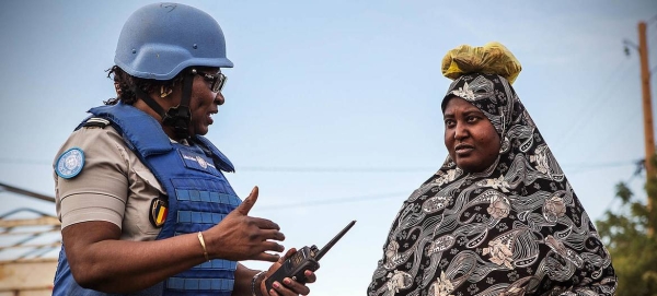 A female UN peacekeeper interacts with a local woman in the Ménaka region of Mali. — Courtesy photo