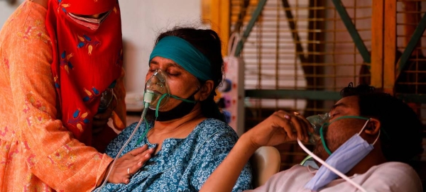 COVID-19 patients receive oxygen at a place of worship in Ghaziabad, India, in this courtesy file picture.