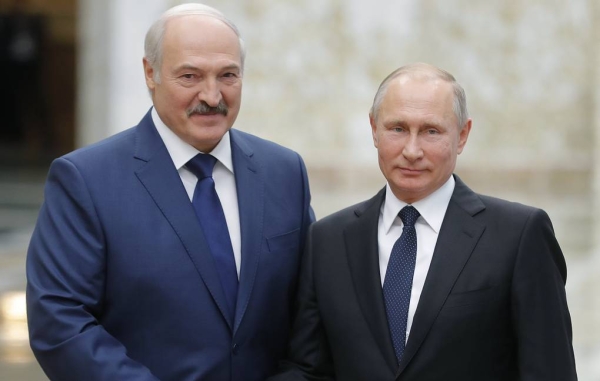 Russian President Vladimir Putin, right, is seen with his Belarus counterpart Alexander Lukashenko in this courtesy file photo. 