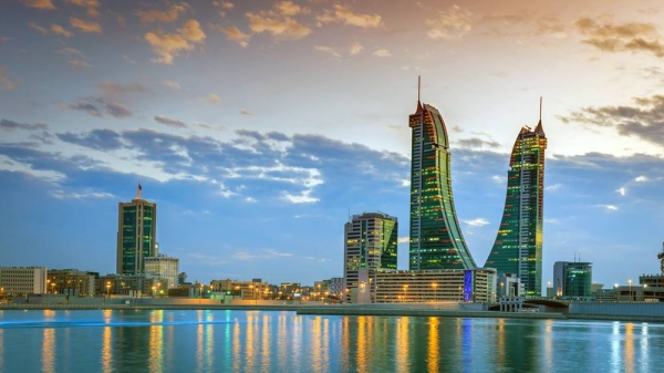 Beautiful sky and Bahrain skyline with reflection after dusk.