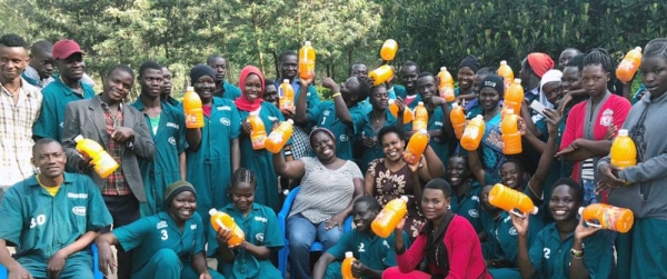 Julian Omalla (center right) with her employees at Delight Uganda Limited. — courtesy Delight Uganda Limited