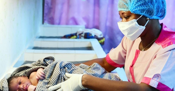 

Nurses are wearing masks and gloves to protect against the coronavirus, in the health center of Port Bouet, a suburb of Abidjan, in the South of Côte d'Ivoire. — courtesy UNICEF/Frank Dejongh