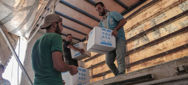 Aid provided by the United Nations is delivered to Syria from Turkey across the Bab El Hawa border crossing in this June 2020 file photo.
