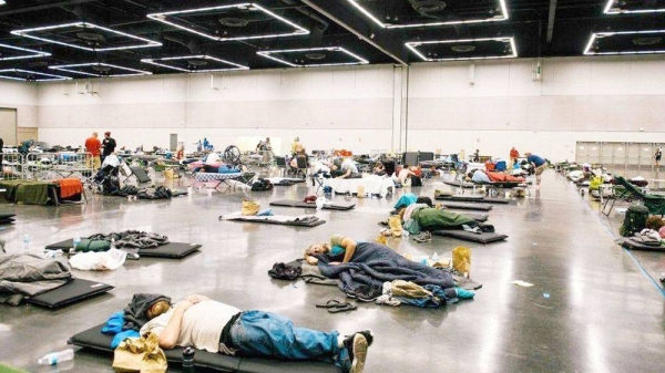 Several people have died in Vancouver, Canada, amid an unprecedented heatwave that has smashed temperature records, said Canadian police. People are seen taking refuge at a shelter to escape the heat.