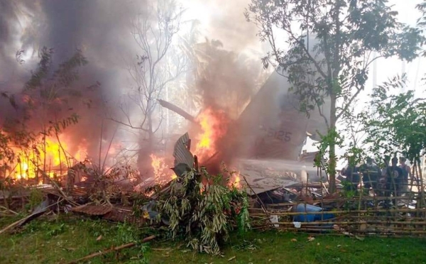 A videograb shows the remains of a Philippine military C-130 plane that crashed in Patikul town, Jolo province, southern Philippines on Sunday.