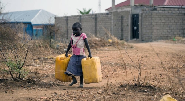 A child carries empty jerry cans to fill with water from a nearby tap providing untreated water from the Nile river in Juba, South Sudan. — courtesy UNICEF/Phil Hatcher-Moore