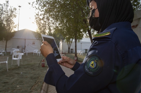 Keeping a watchful eye, Civil Defense women personnel swing into action