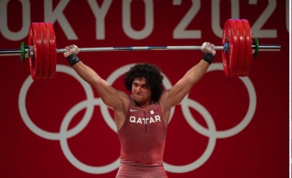 23-year-old Ibrahim won the gold medal in the 96kg category at the Tokyo games lifting a total weight of 402kg, which is an Olympic record. — QNA