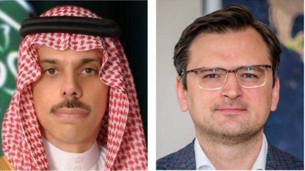 Saudi Arabia's Foreign Minister Prince Faisal Bin Farhan, left, received a phone call on Monday from his Ukrainian counterpart Dmytro Kuleba. 