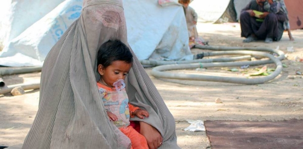 A mother and her child in the Haji camp for internally displaced people in Kandahar, Afghanistan. — courtesy UNICEF Afghanistan