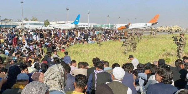 Afghans waiting to be evacuated at the Kabul airport.